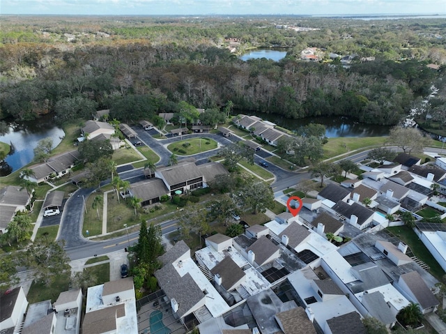 drone / aerial view with a water view