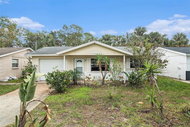 ranch-style house featuring central air condition unit, a porch, stucco siding, an attached garage, and driveway