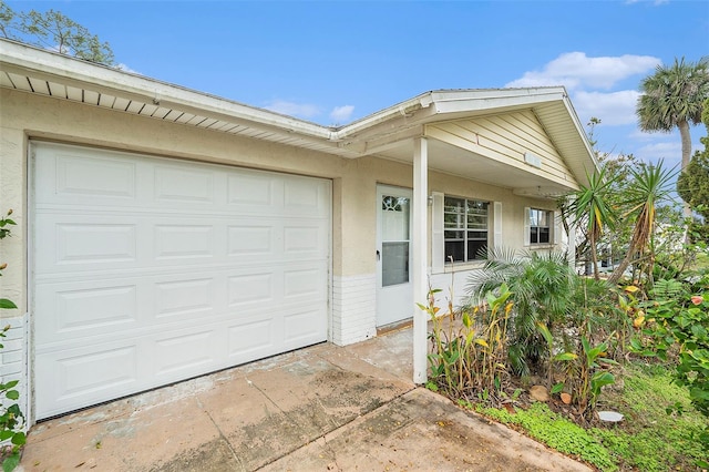 ranch-style home featuring a garage