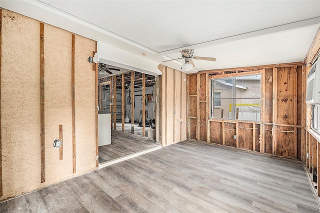 miscellaneous room with hardwood / wood-style flooring and ceiling fan