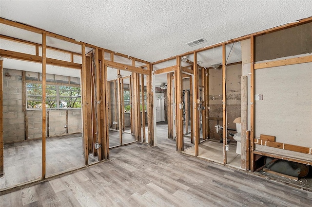 miscellaneous room featuring hardwood / wood-style floors