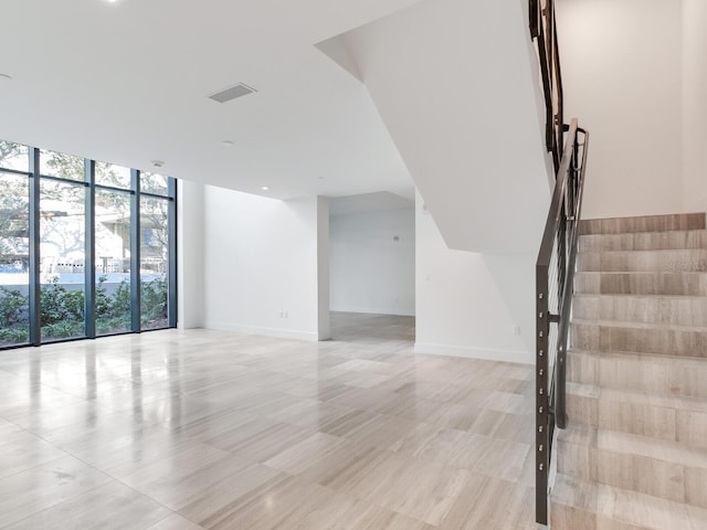 stairway with expansive windows