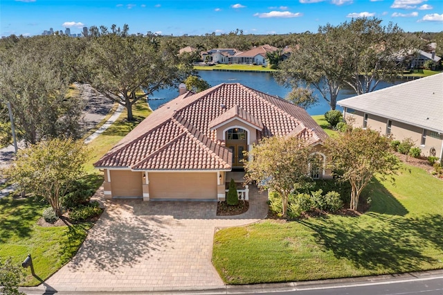 bird's eye view with a water view