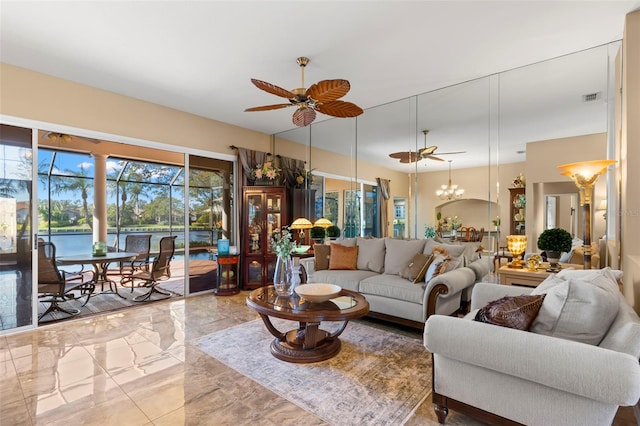 living room featuring a water view and ceiling fan