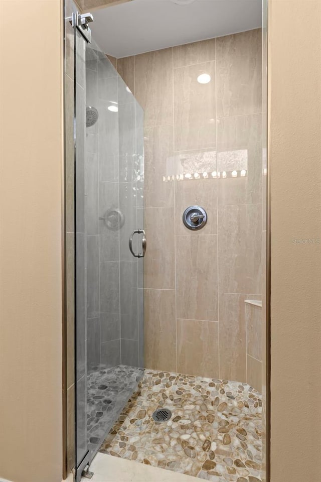 bathroom featuring walk in shower