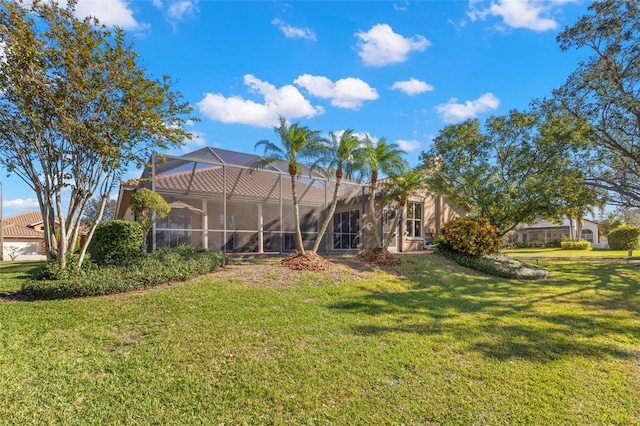 view of yard featuring a lanai