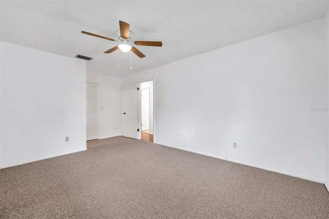 carpeted empty room with ceiling fan