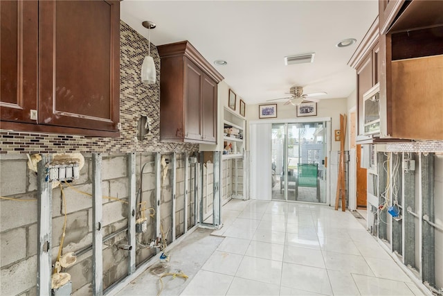 hallway featuring light tile patterned flooring