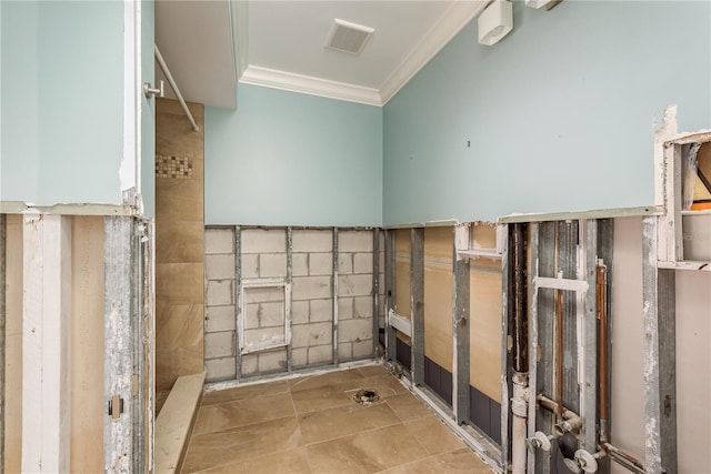 bathroom with tile patterned flooring and ornamental molding