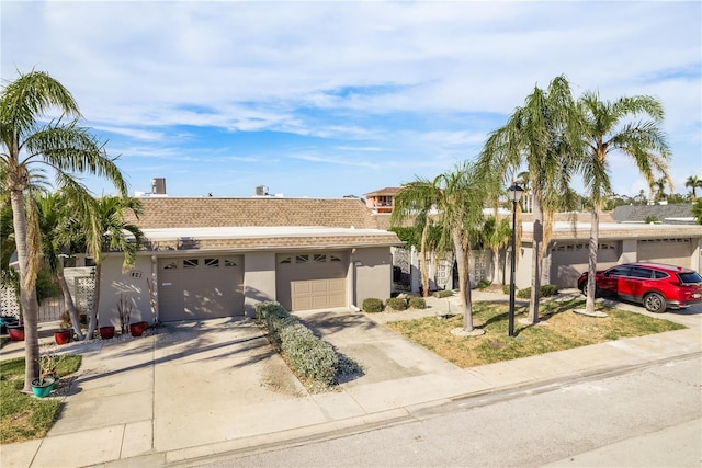 view of front of property with a garage