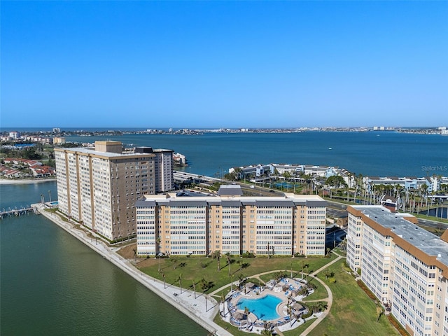 birds eye view of property with a water view