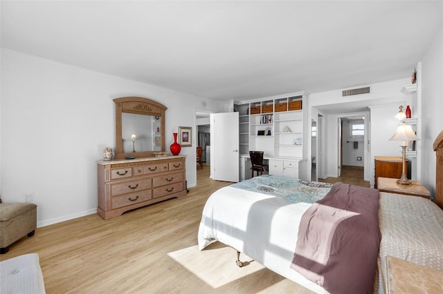 bedroom featuring light hardwood / wood-style flooring