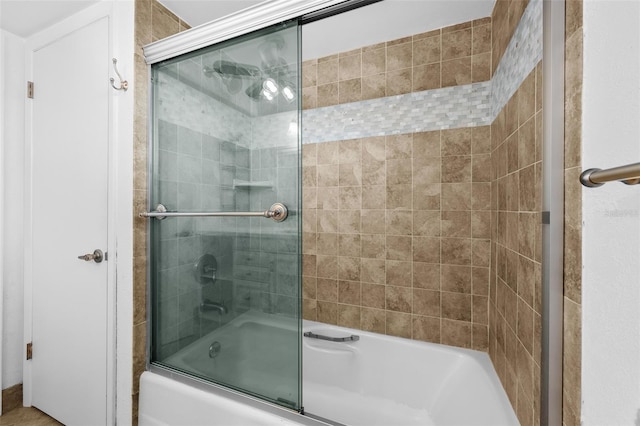 bathroom featuring enclosed tub / shower combo