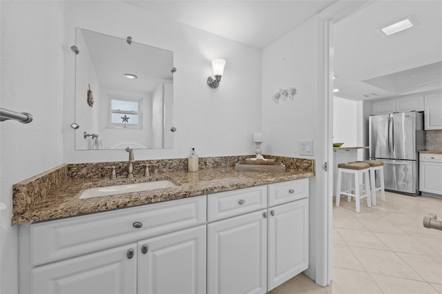 bathroom featuring vanity and tile patterned floors