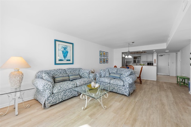 living room with hardwood / wood-style floors