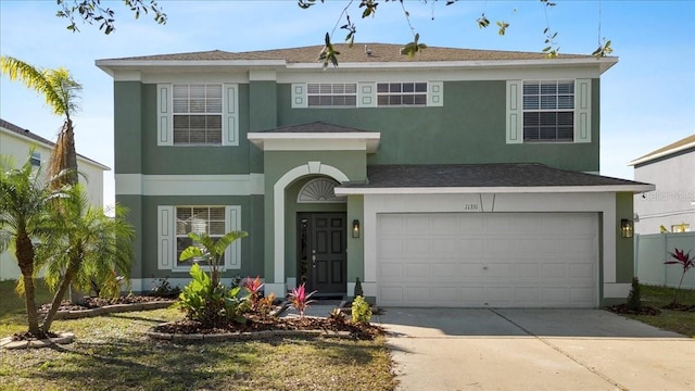 view of front of property featuring a garage