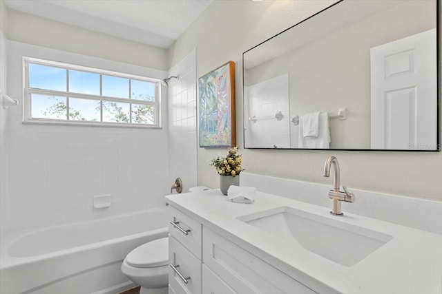 full bathroom with vanity, toilet, and tiled shower / bath combo