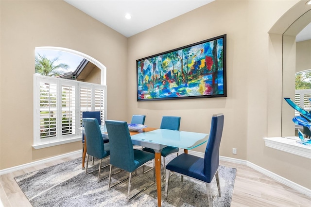 dining space featuring light hardwood / wood-style flooring