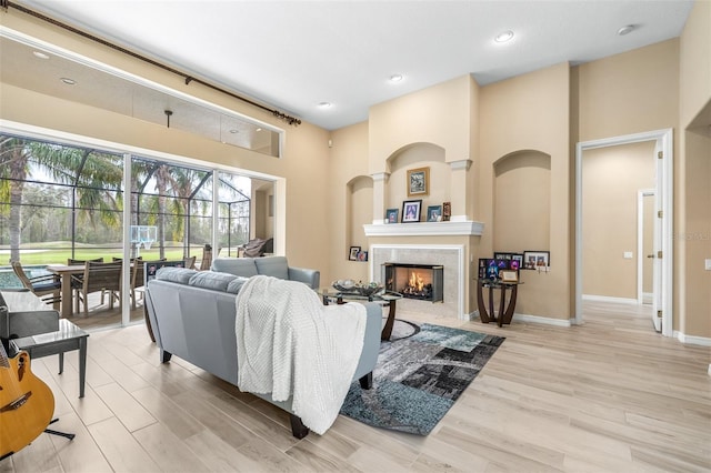 living room with a towering ceiling