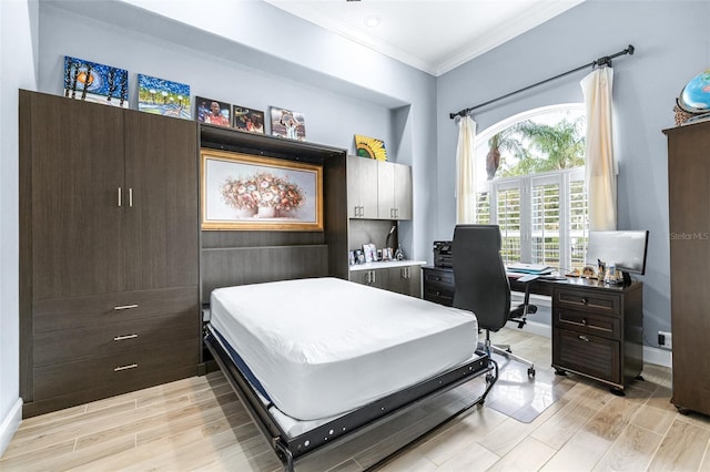 bedroom with crown molding