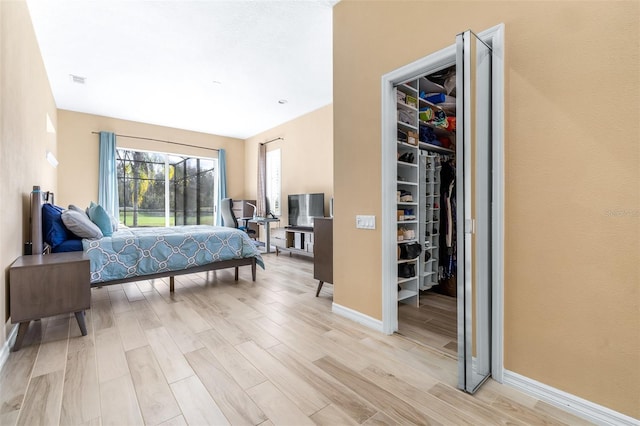 bedroom featuring light hardwood / wood-style floors