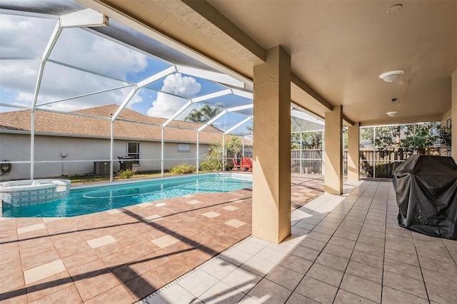 view of pool featuring a patio, a lanai, and a grill