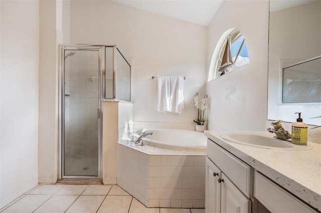 bathroom featuring separate shower and tub, tile patterned flooring, vanity, and vaulted ceiling