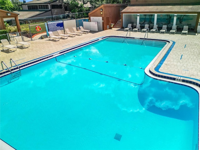 view of pool featuring a patio area