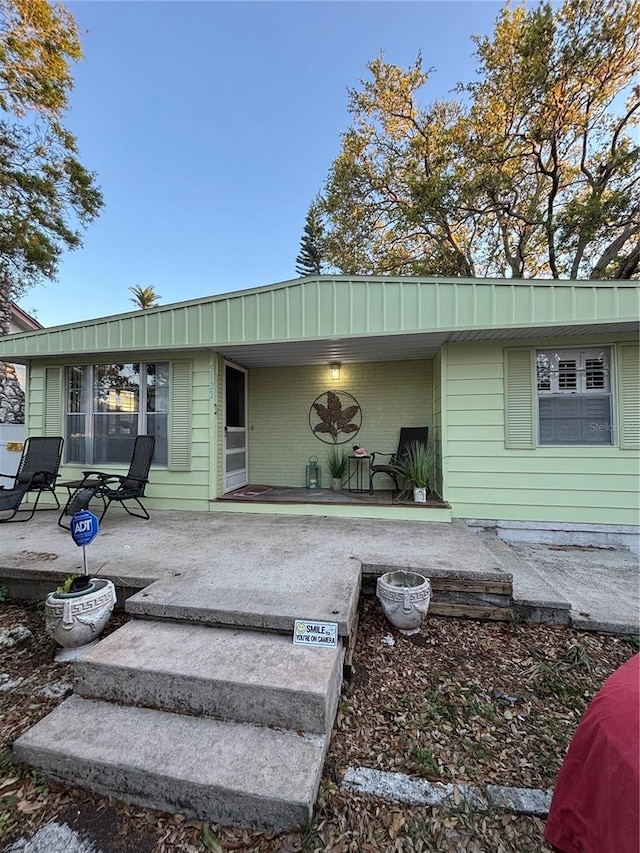 view of front of property with a patio area