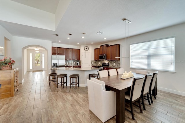 dining area featuring light hardwood / wood-style flooring