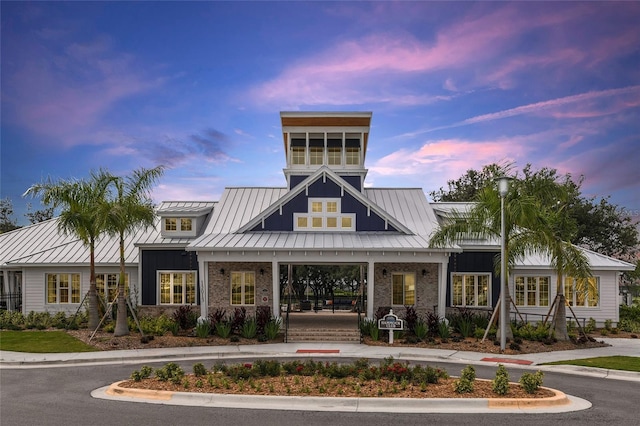 view of outdoor building at dusk