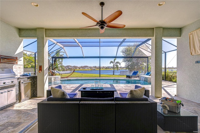 view of patio / terrace featuring ceiling fan, area for grilling, a lanai, and a grill