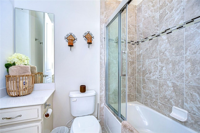 bathroom featuring shower / bath combination with glass door and toilet