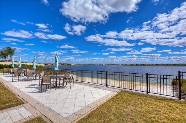 view of patio featuring a water view