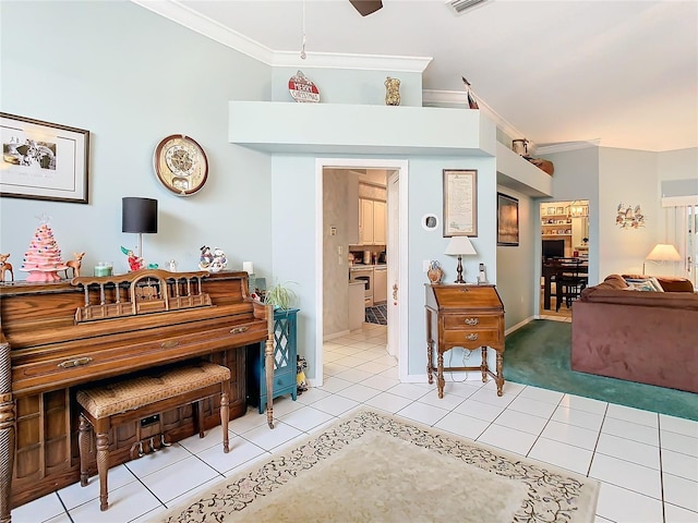 miscellaneous room with ceiling fan, light tile patterned floors, and crown molding