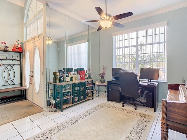 tiled home office with ceiling fan and ornamental molding