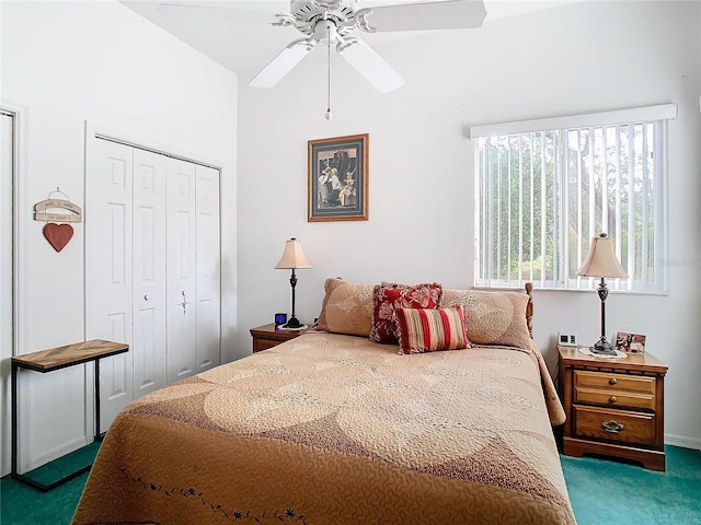 carpeted bedroom featuring a closet and ceiling fan