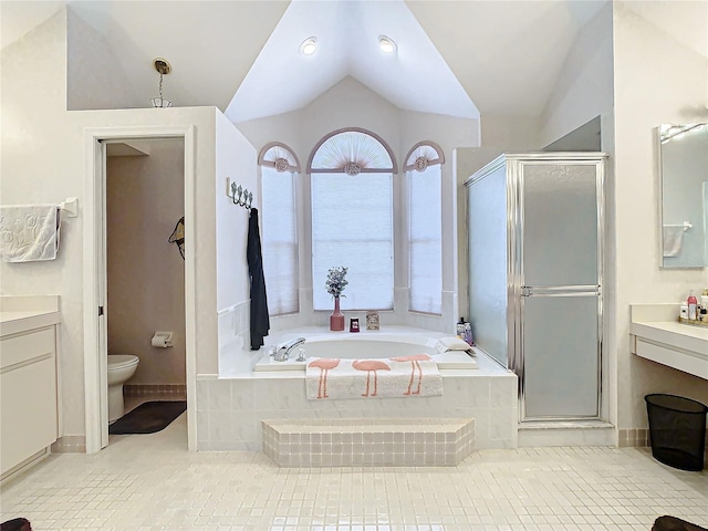 full bathroom with vanity, lofted ceiling, tile patterned flooring, toilet, and shower with separate bathtub