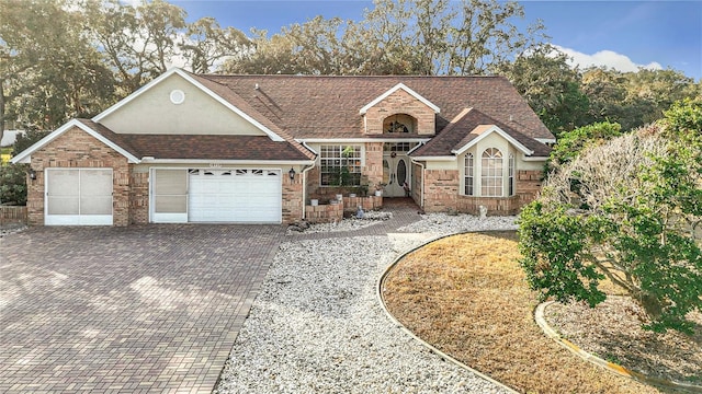 view of front of home with a garage