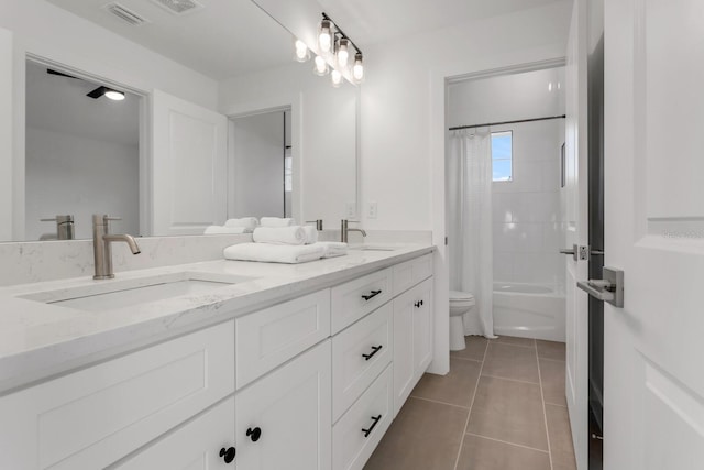 full bathroom with tile patterned flooring, vanity, shower / bath combination with curtain, and toilet