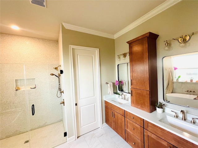 bathroom with vanity, crown molding, and independent shower and bath