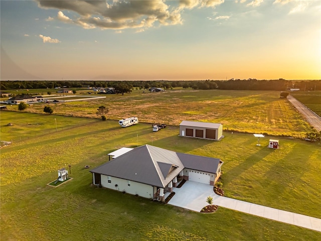 aerial view at dusk with a rural view