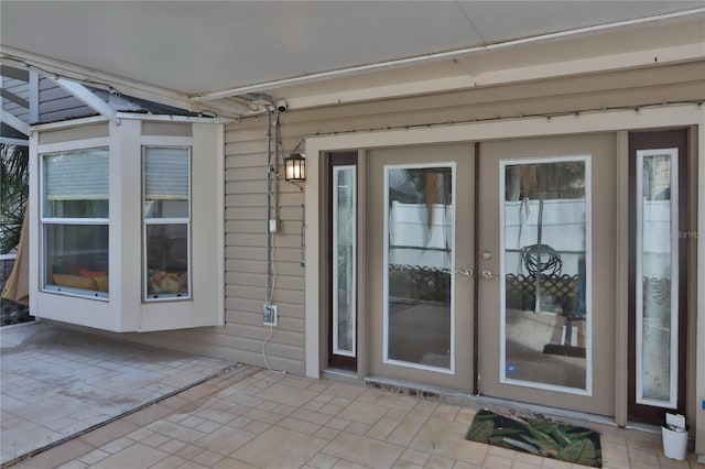 doorway to property featuring a patio