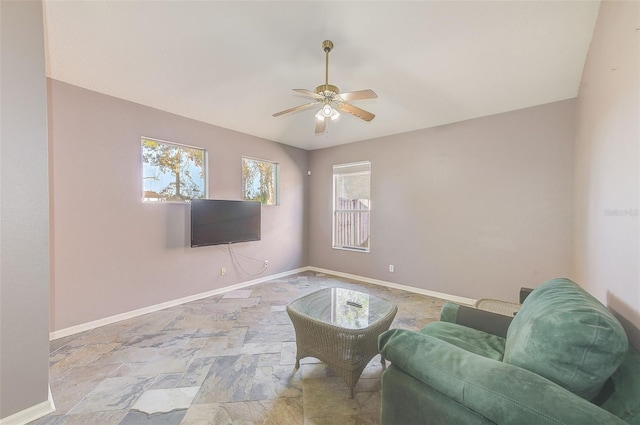 sitting room with ceiling fan