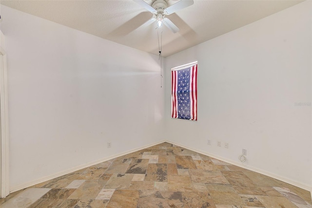 unfurnished room with ceiling fan