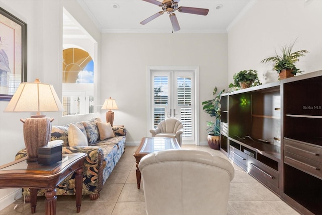 tiled living room featuring french doors, ceiling fan, and crown molding