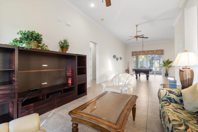 living room featuring light tile patterned flooring, ceiling fan, ornamental molding, and pool table