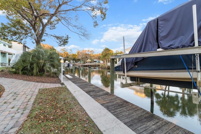 view of dock with a water view