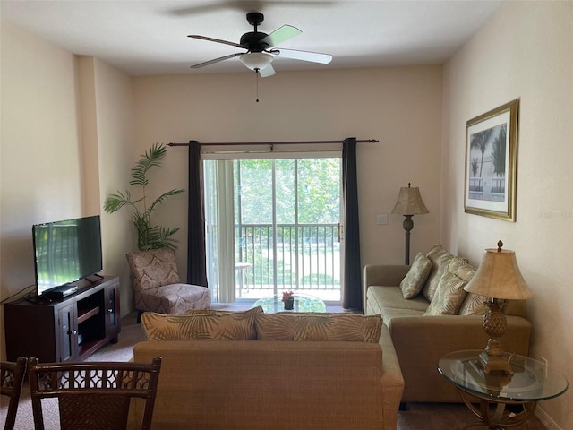 living room featuring ceiling fan