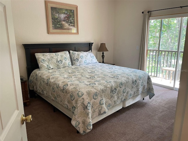 carpeted bedroom with access to exterior